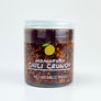 Jar of Momofuku Chili Crunch on a white background