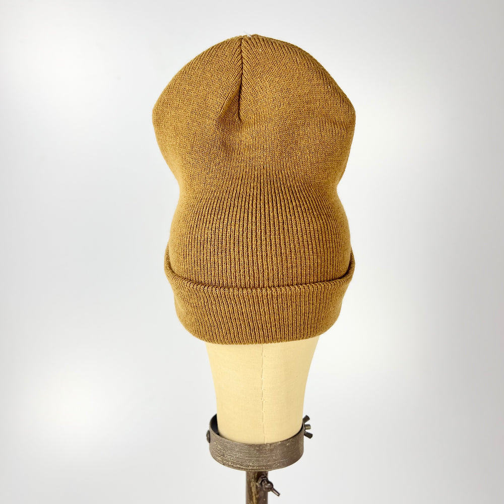 Acme tan cuffed knit hat displayed on mannequin highlighting Jersey City embroidered beanie ribbed knit