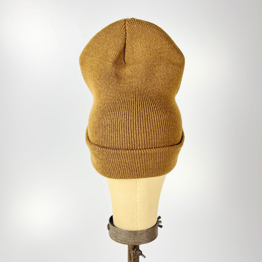 Acme tan cuffed knit hat displayed on mannequin highlighting Jersey City embroidered beanie ribbed knit