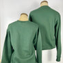 Back view of two green Garden State sweatshirts displayed on mannequins by Kanibal & Co