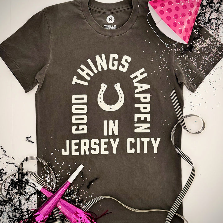 Good Things Happen in Jersey City shirt by Kanibal Co black with white text and horseshoe design