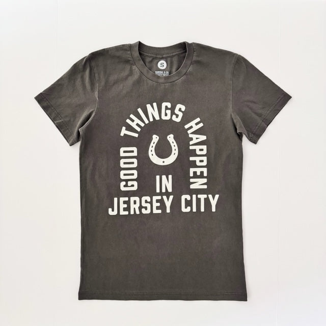 Kanibal & Co. Good Things Happen in Jersey City shirt in charcoal gray with white text and horseshoe design