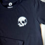Black devour what you love shirt by Kanibal & Co. with small white skull graphic on chest