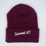 Kanibal & Co. maroon Summit NJ embroidered beanie with white stitched text on folded cuff