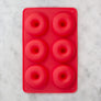 Red silicone doughnut pan with six molds for easy non-stick baking by Farm Steady Brooklyn Brew Shop