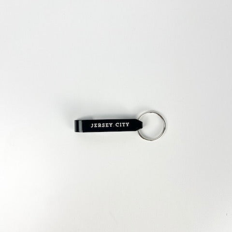 Black keychain with 'Jersey City' text on a white background
