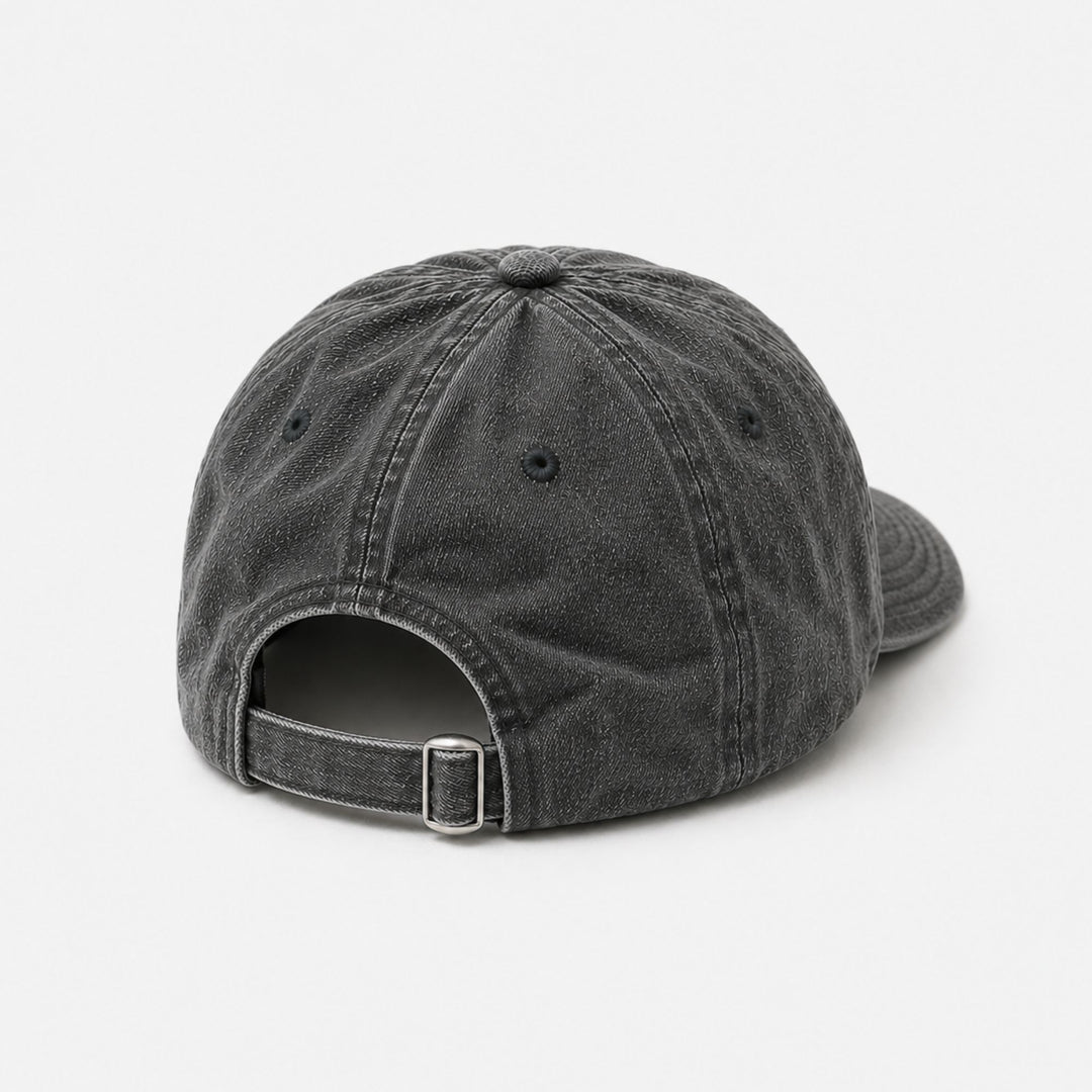 Black denim cap on a white background