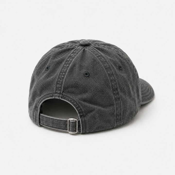 Black denim cap on a white background