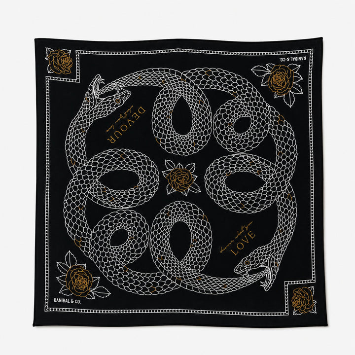 Black bandana with white and gold snake design on a white background