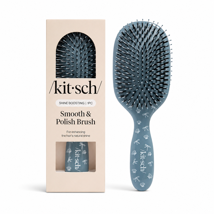 Kit-sch Smooth & Polish Brush set shown with its beige packaging box and the blue paddle-style brush beside it on a white background.