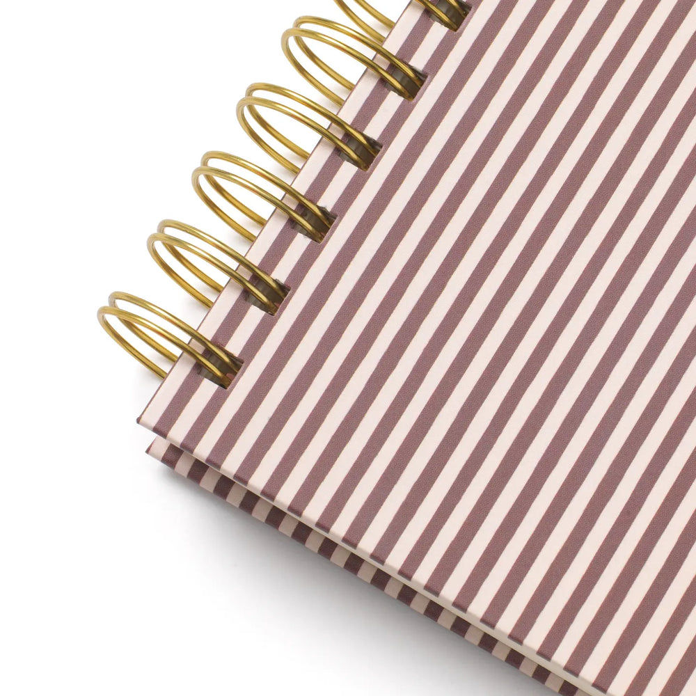 B5 hardcover spiral notebook with a stylish striped design and durable metal coils