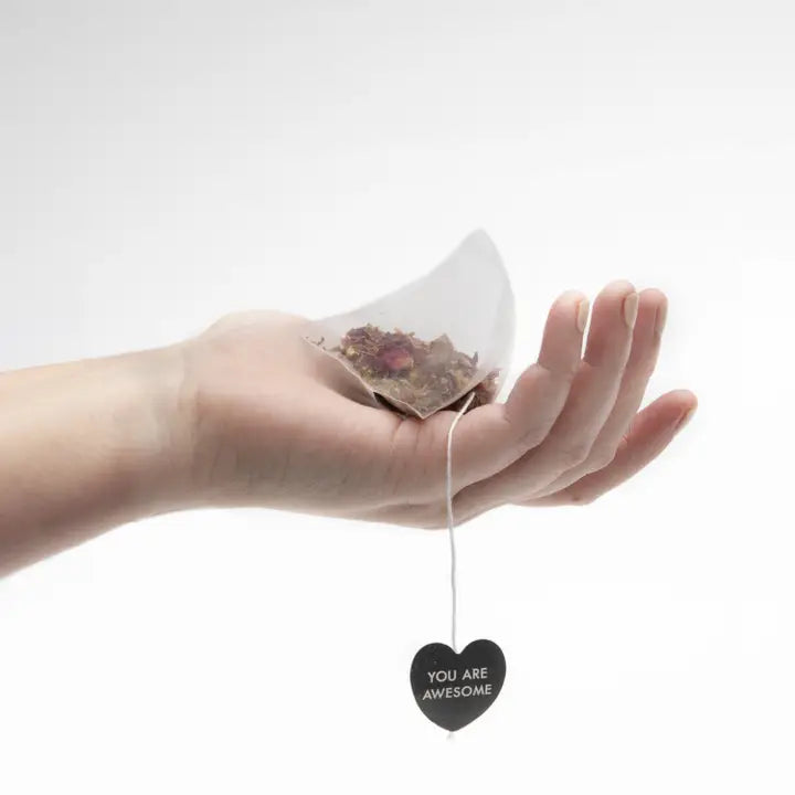 Big Heart Tea Co. Spicy Pumpkin Tea in a biodegradable tea bag held in a hand