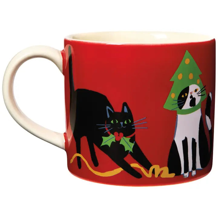 Danica cat Christmas mug featuring playful cats with holiday decorations on a vibrant red background