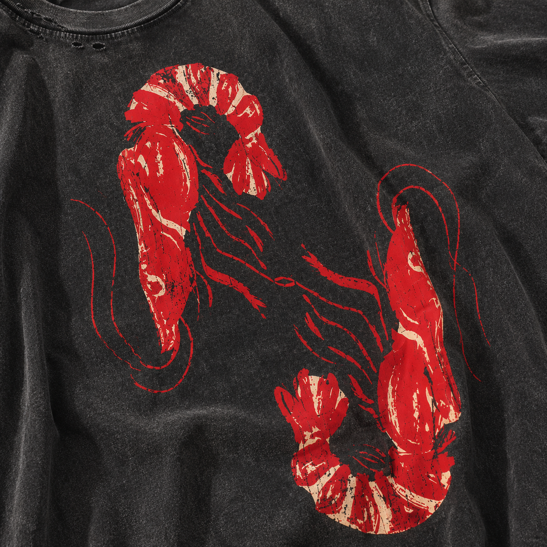 Black t-shirt with red and white crawfish design on a plain background