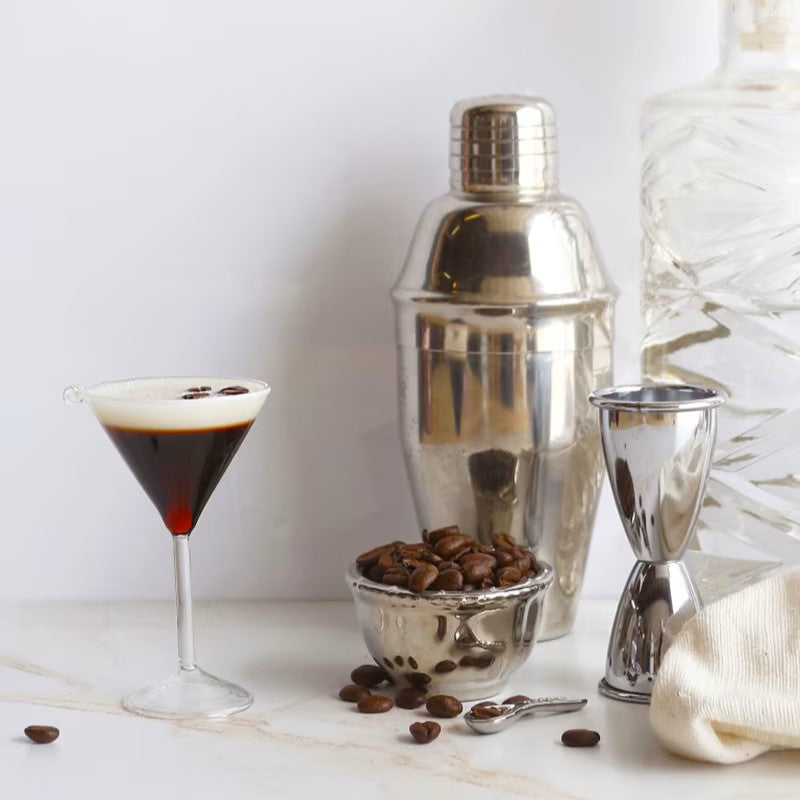 Cody Foster & Co. espresso martini ornament featuring a cocktail glass with coffee beans