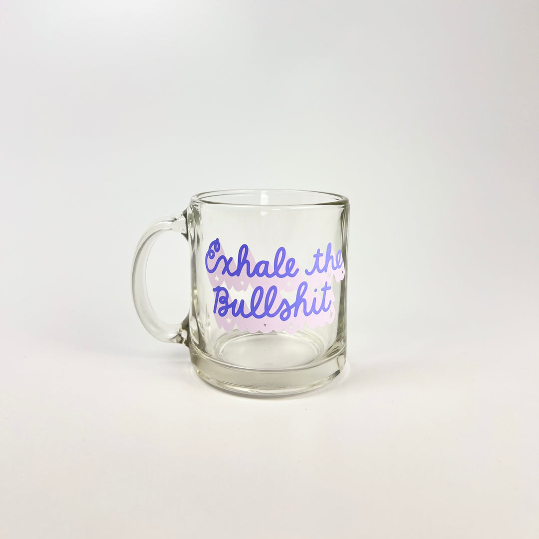 Talking Out of Turn clear glass mug with purple script reading exhale the bullshit mug for coffee or tea