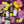 Practical Magic fig lemontini cocktail kit with bottles, fresh lemons, flowers, and glassware on purple background