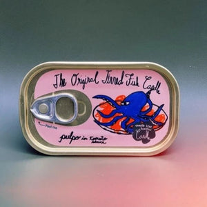unopened fish tin that says "The Original Tinned Fish Candle" Pulpo in Tomato Sauce scented