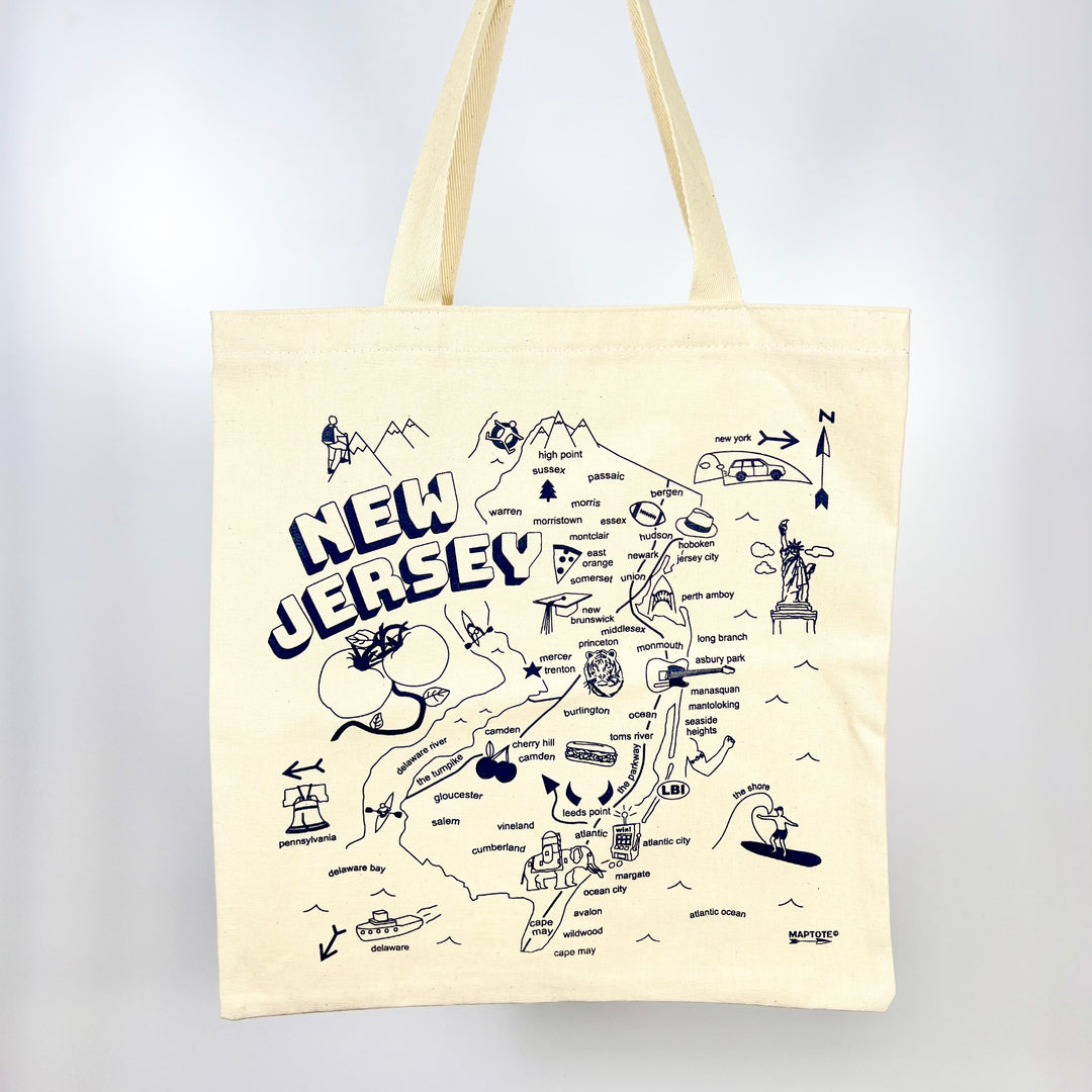 MapTote New Jersey map tote bag cream canvas with navy hand drawn state map showing landmarks