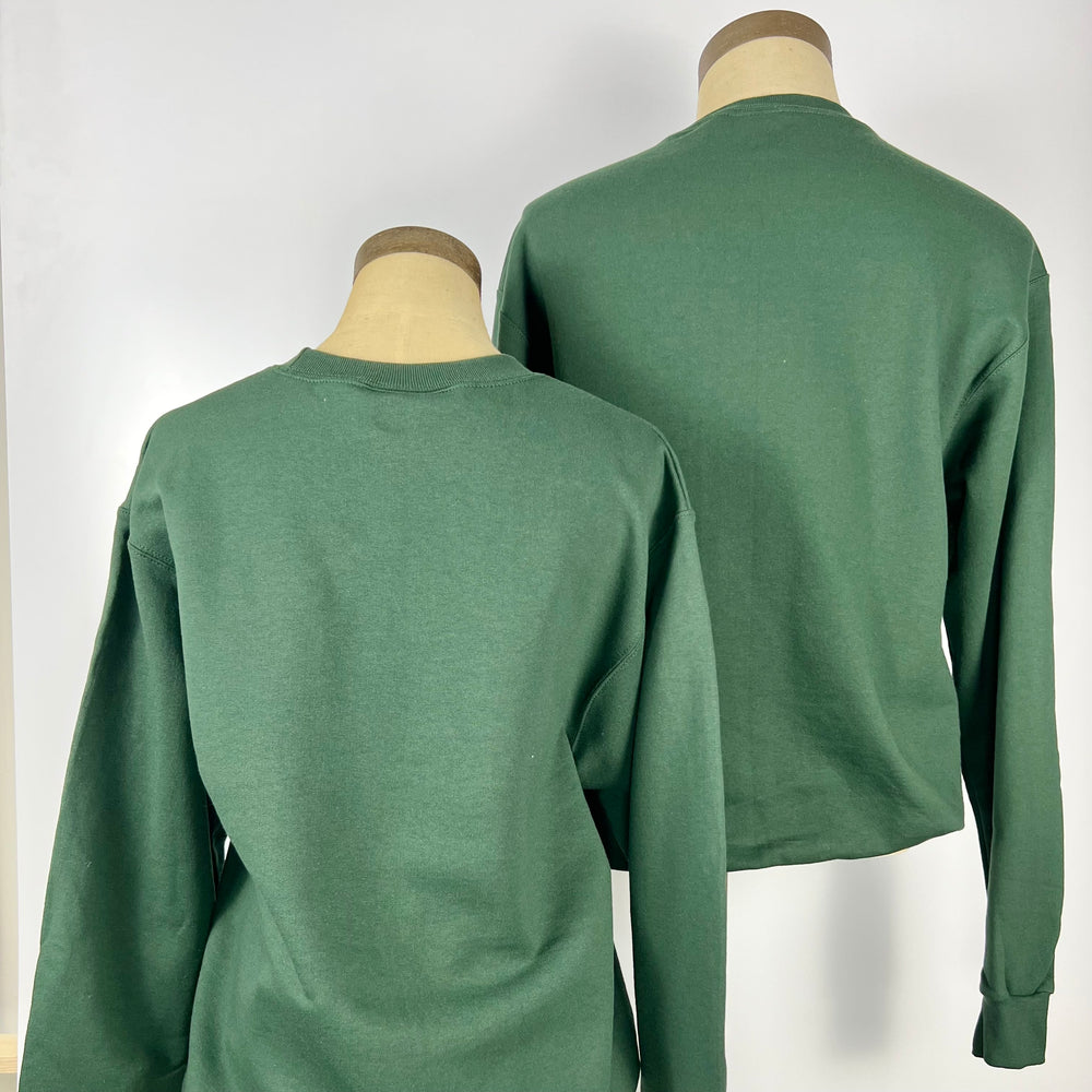 Back view of two green Garden State sweatshirts displayed on mannequins by Kanibal & Co