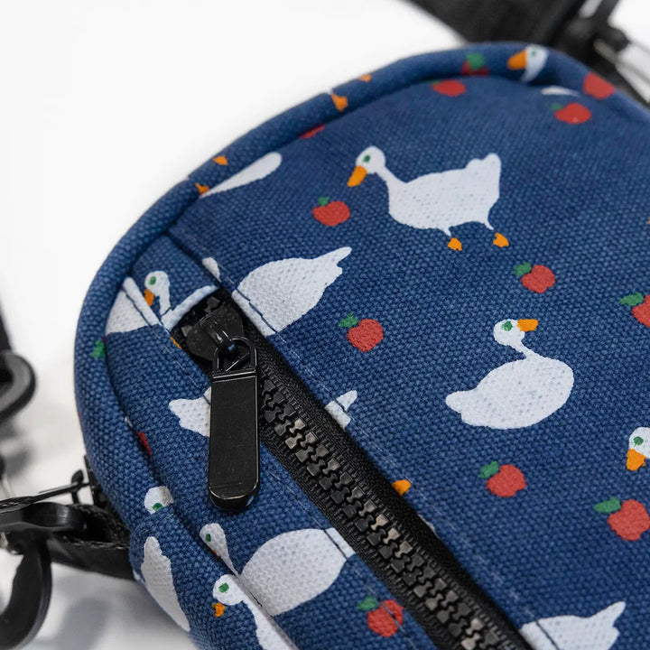 Goose print crossbody bag by Three Potato Four with colorful goose and apple pattern