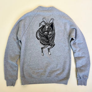 Kanibal & Co. gray raglan crewneck sweatshirt with black graphic design on back