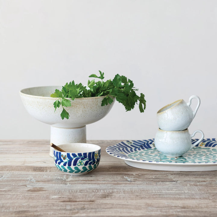 Hand painted vine bowl from Creative Co-Op with fresh herbs and stylish servingware
