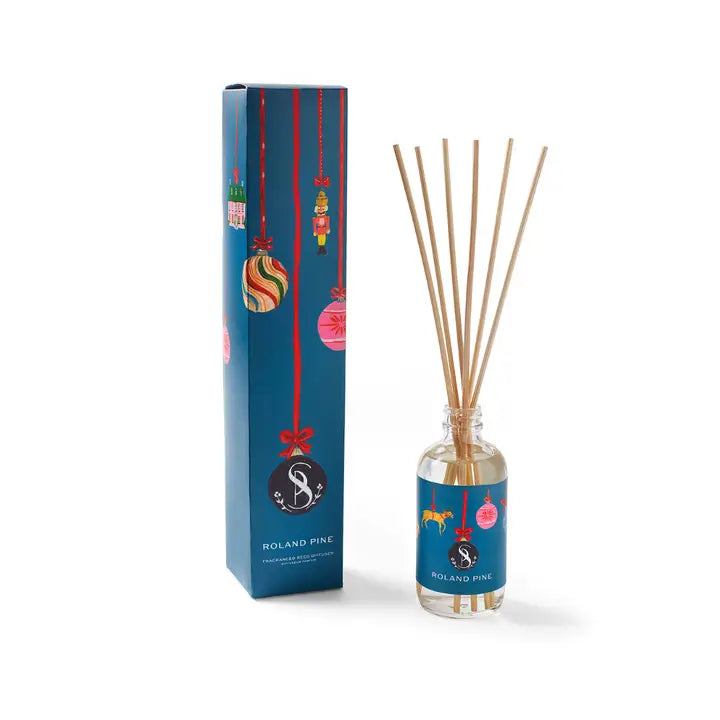 Soap & Paper Factory holiday reed diffuser with festive package design and natural reeds for home fragrance