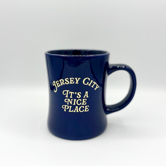 Kanibal & Co. navy blue Jersey City mug with It's a Nice Place text in cream color