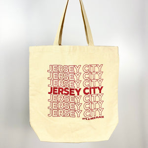 Jersey City tote bag by Vital Industries with repeated red text design on natural canvas fabric