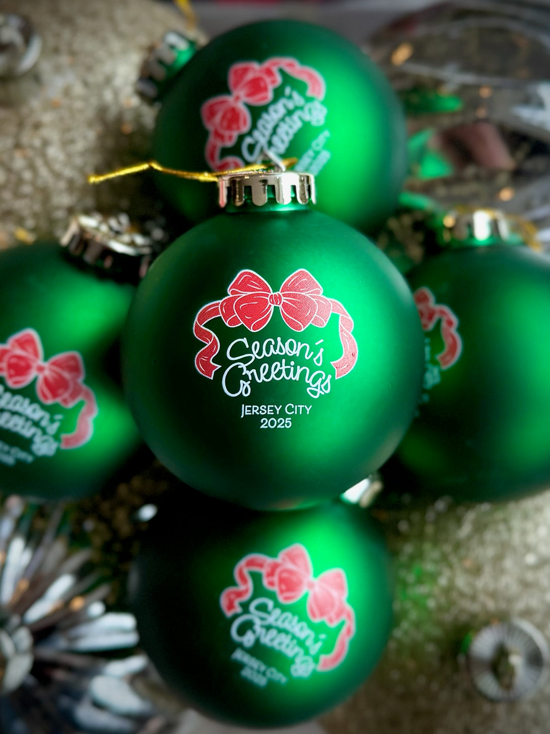 Limited Edition Jersey City ornament 2025 in green with a festive design and gold accents