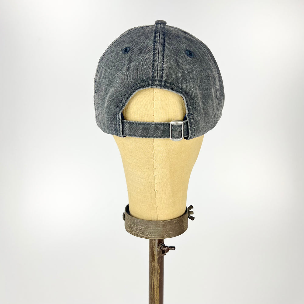Back view of a New Jersey embroidered baseball hat with an adjustable strap for a comfortable fit