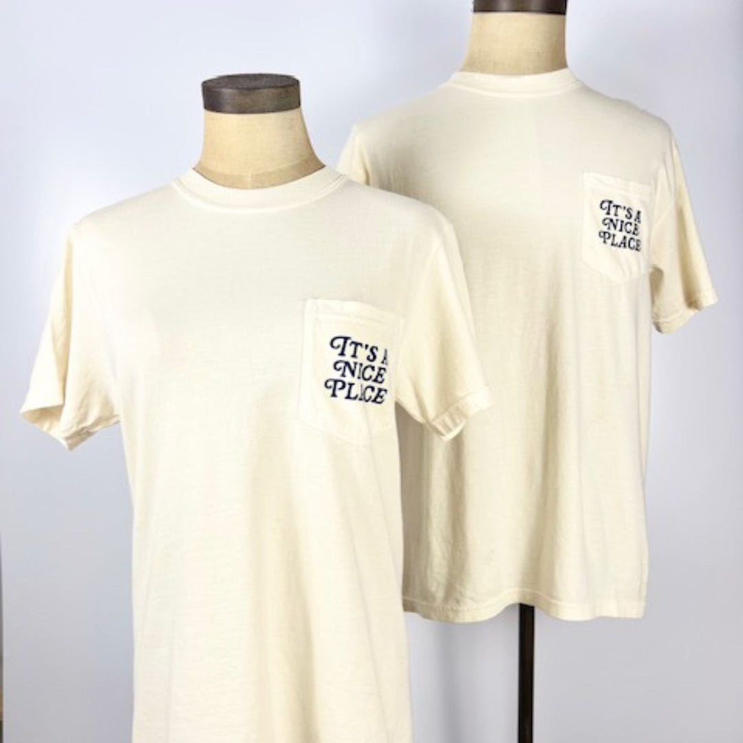 Kanibal & Co Nice Place Jersey City shirt in cream with pocket text design on front and back
