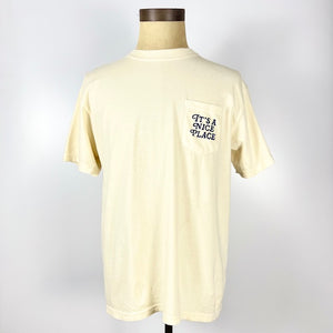 Cream Nice Place Jersey City shirt with front pocket and text It’s a Nice Place printed on the pocket