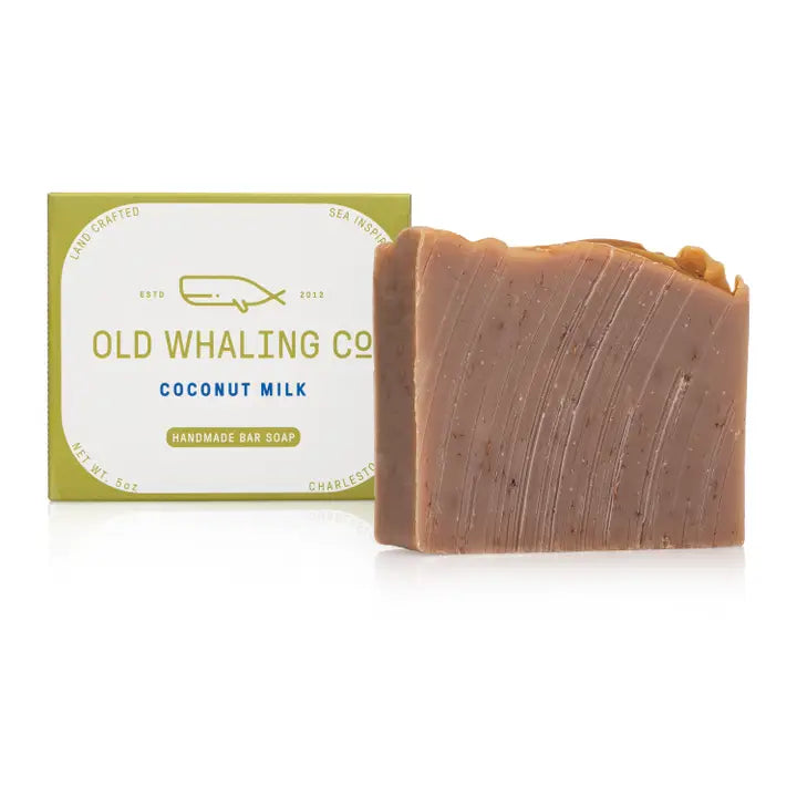 Old Whaling Co coconut milk bar soap natural brown handmade bar next to green and white branded box