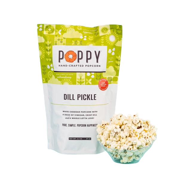 Poppy Handcrafted Dill Pickle Popcorn in a bag with a bowl of popcorn for snacking
