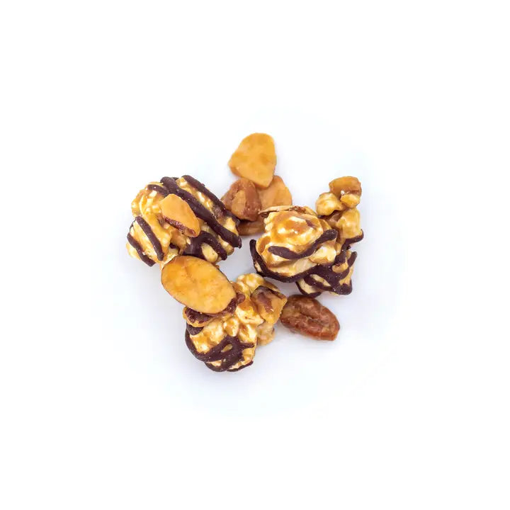 Poppy Handcrafted Popcorn Reindeer Crunch popcorn with chocolate drizzle and mixed nuts