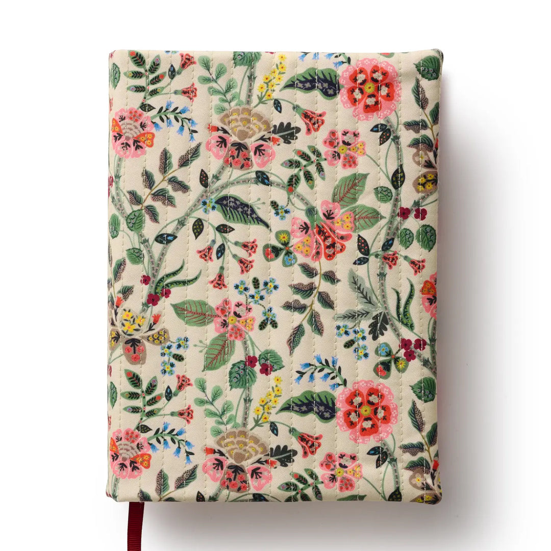 Floral covered Rifle Paper Co. quilted floral journal with vibrant colors and a ribbon marker