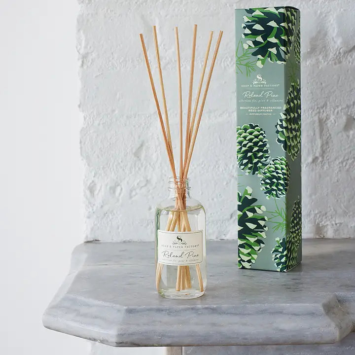 Roland Pine reed diffuser by Soap & Paper Factory with natural reed sticks and elegant packaging