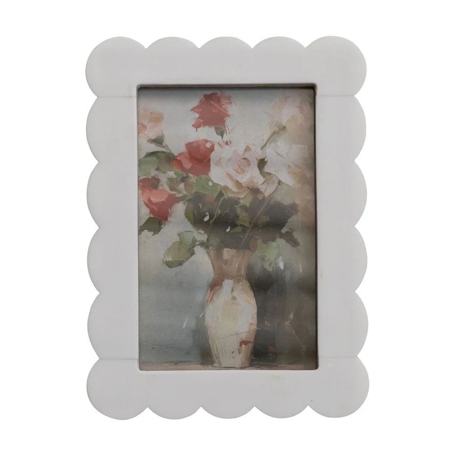 Scalloped resin photo frame in white featuring a floral vase artwork, perfect for home decor