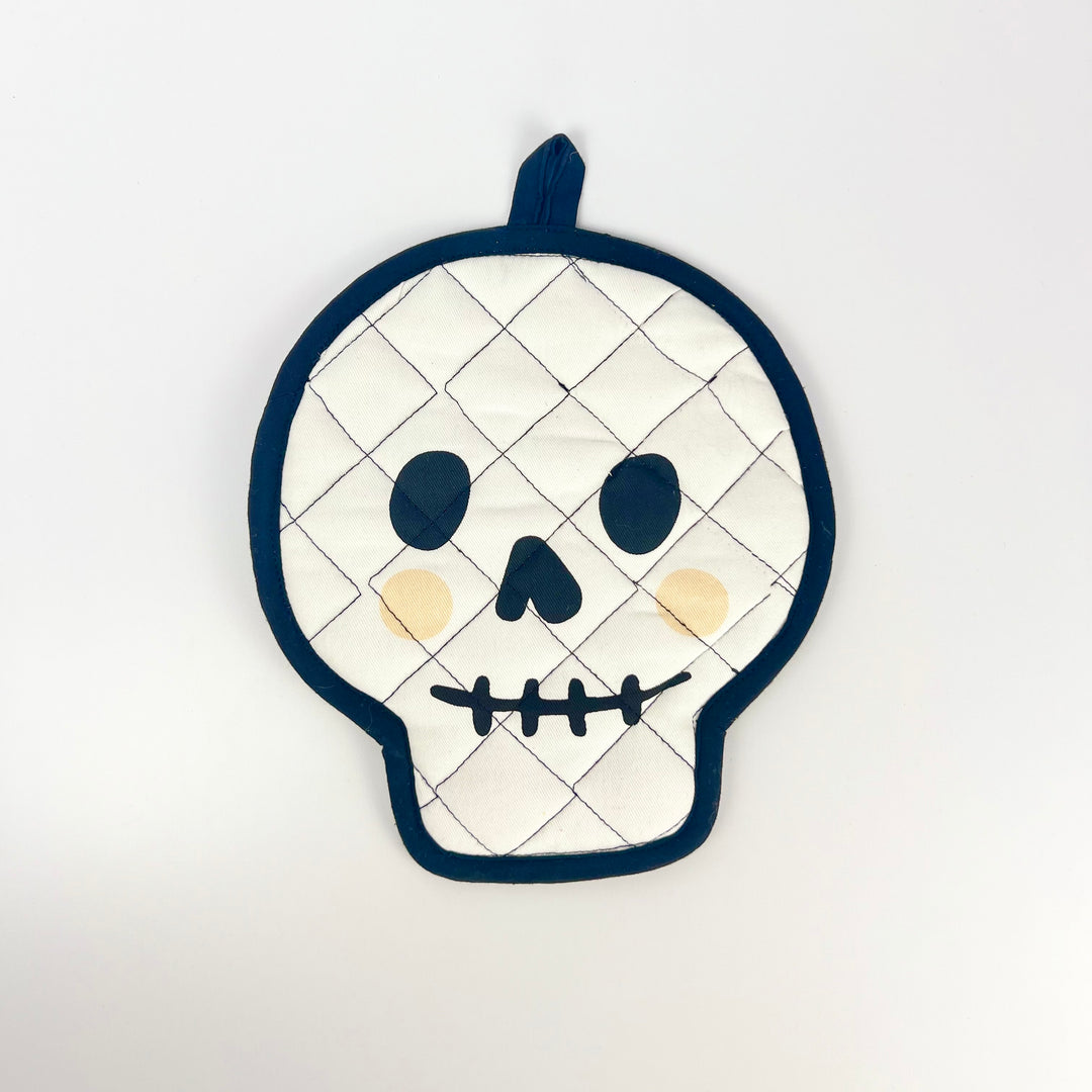 Danica skull pot holder quilted white skull shaped textile with navy trim black facial features and hanging loop