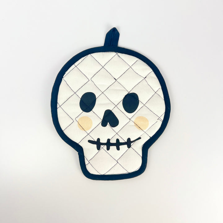 Danica skull pot holder quilted white skull shaped textile with navy trim black facial features and hanging loop