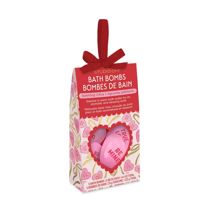 Studio Oh! candy heart bath bombs in a colorful package with festive designs and a ribbon for easy gifting