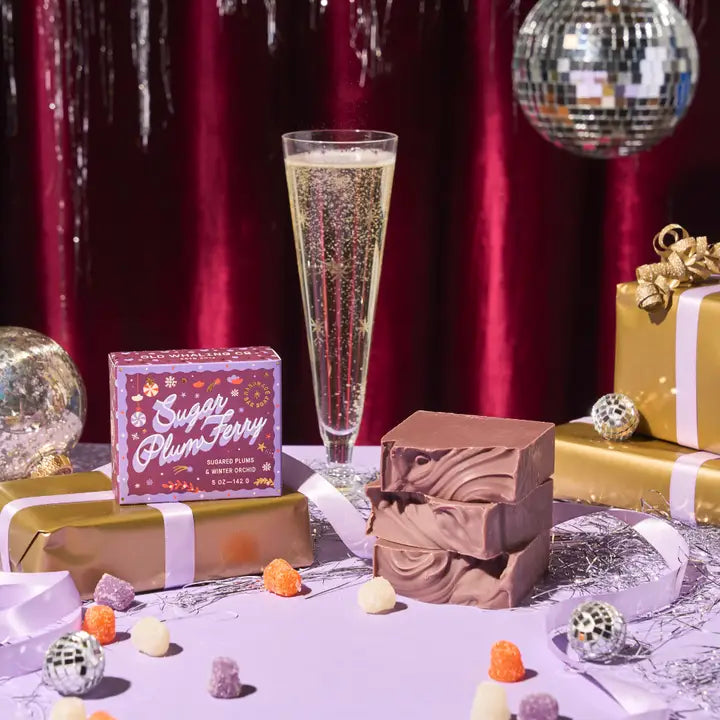 Old Whaling Co sugar plum bar soap displayed with festive decorations and drinks for a holiday celebration