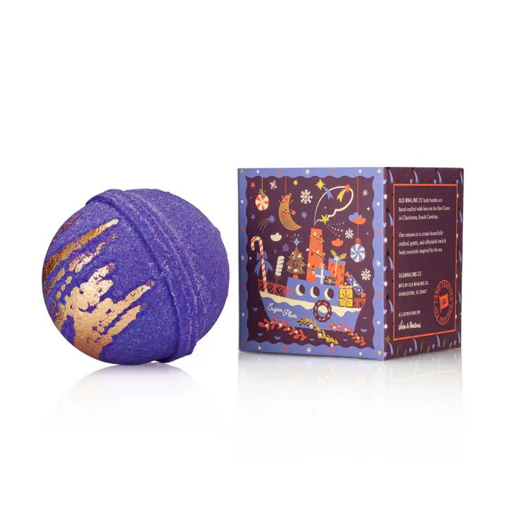 Old Whaling Co sugar plum bath bomb in purple with gold accents and festive packaging