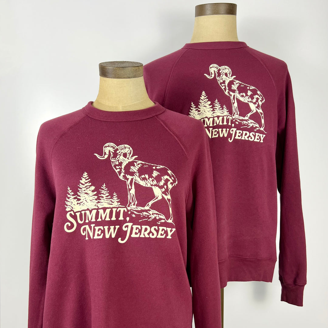 Kanibal & Co maroon Summit New Jersey sweatshirt with mountain goat and tree graphic design