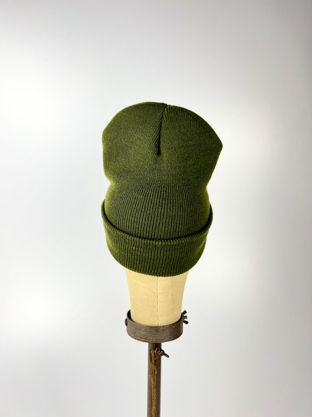 Kanibal and Co olive green Summit NJ embroidered beanie with folded cuff on mannequin display stand