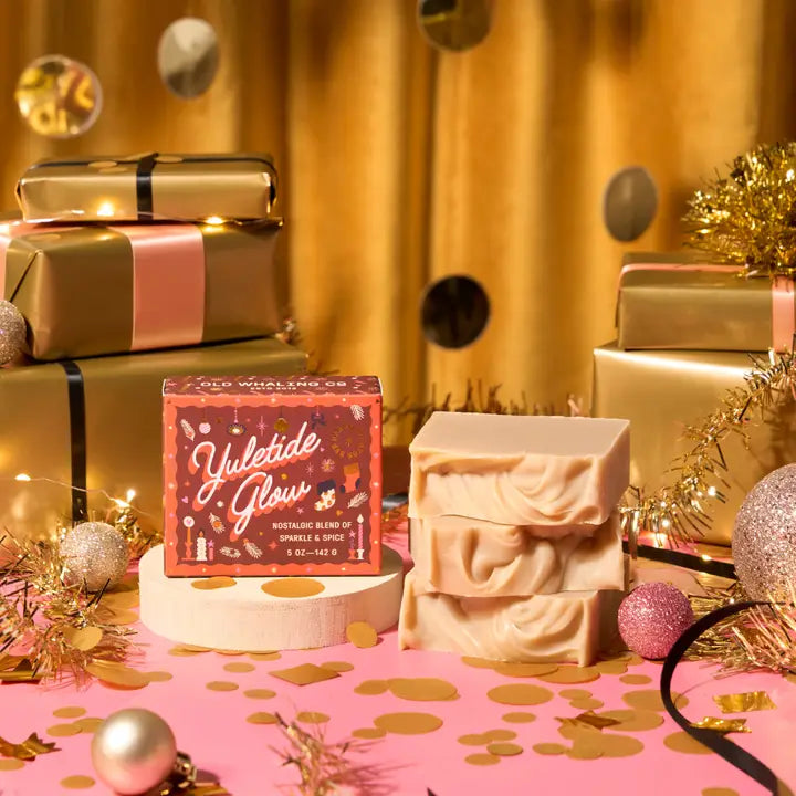 Yuletide Glow Bar Soap by Old Whaling Co with festive packaging and holiday decorations