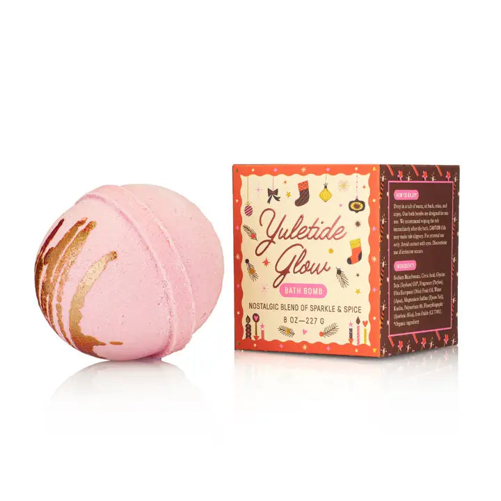 Yuletide Glow bath bomb from Old Whaling Co with pink sparkle and spice blend for festive relaxation