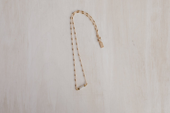  gold electroplated natural pearl charm (tube link) is combined with a gold-filled chain with a unique bead chain design